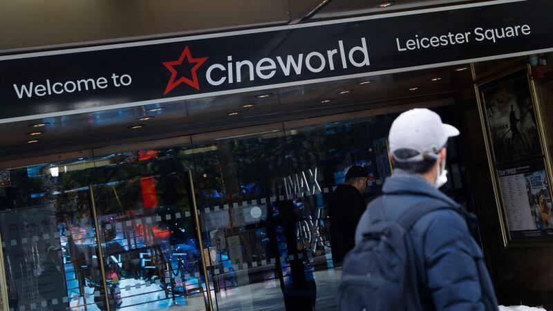A man walks past a Cineworld cinema in Leicester Square, London, on Oct. 5, 2020. Cineworld...