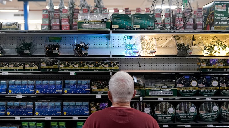 A customer browses the holiday lights section at Blackhawk Hardware, Wednesday, Nov. 1, 2023,...