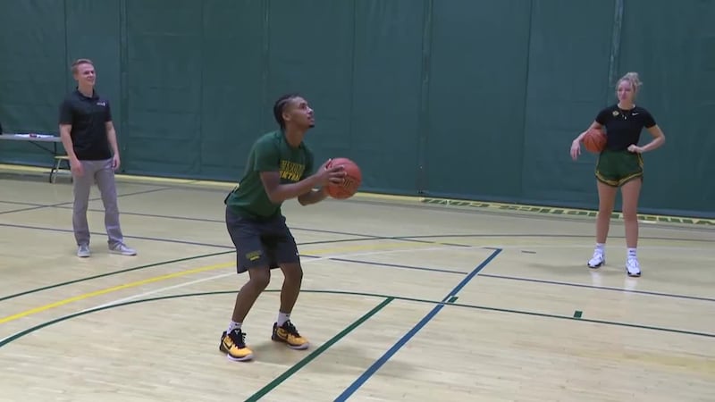 After getting to know the two UVM stars, we play a game of C-A-T with them at Patrick Gym.