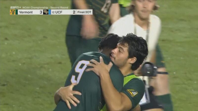 UVM celebrates a thrilling 3-2 road win over UCF in the second round of the NCAA tourament
