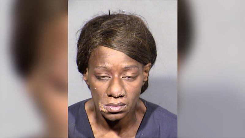 A woman who told store employees "you'll never catch me" while stealing items has been arrested.