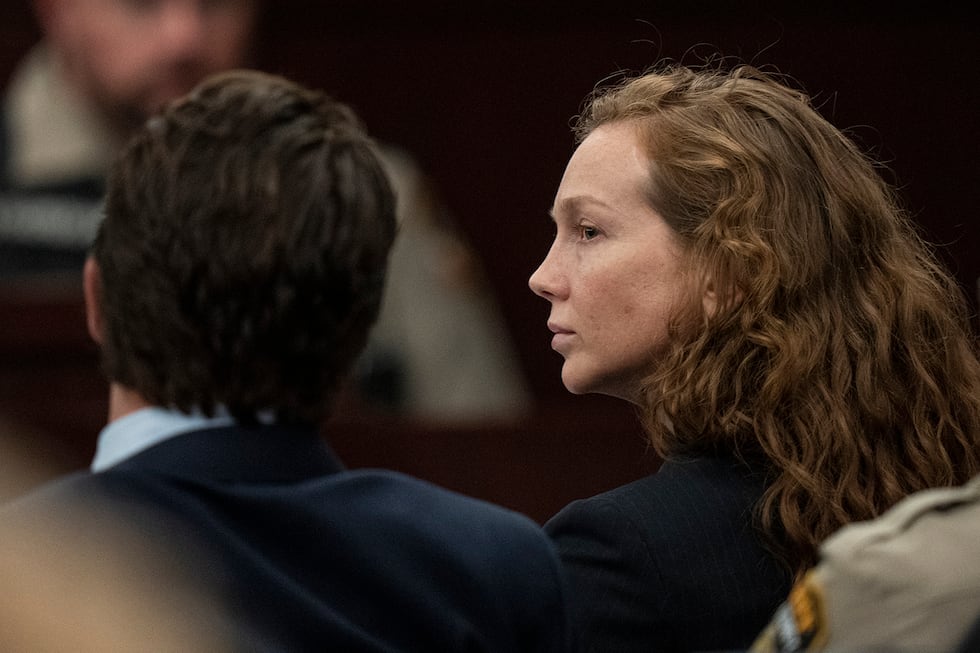 Kaitlin Armstrong sits with her defense lawyers during her murder trial at the...